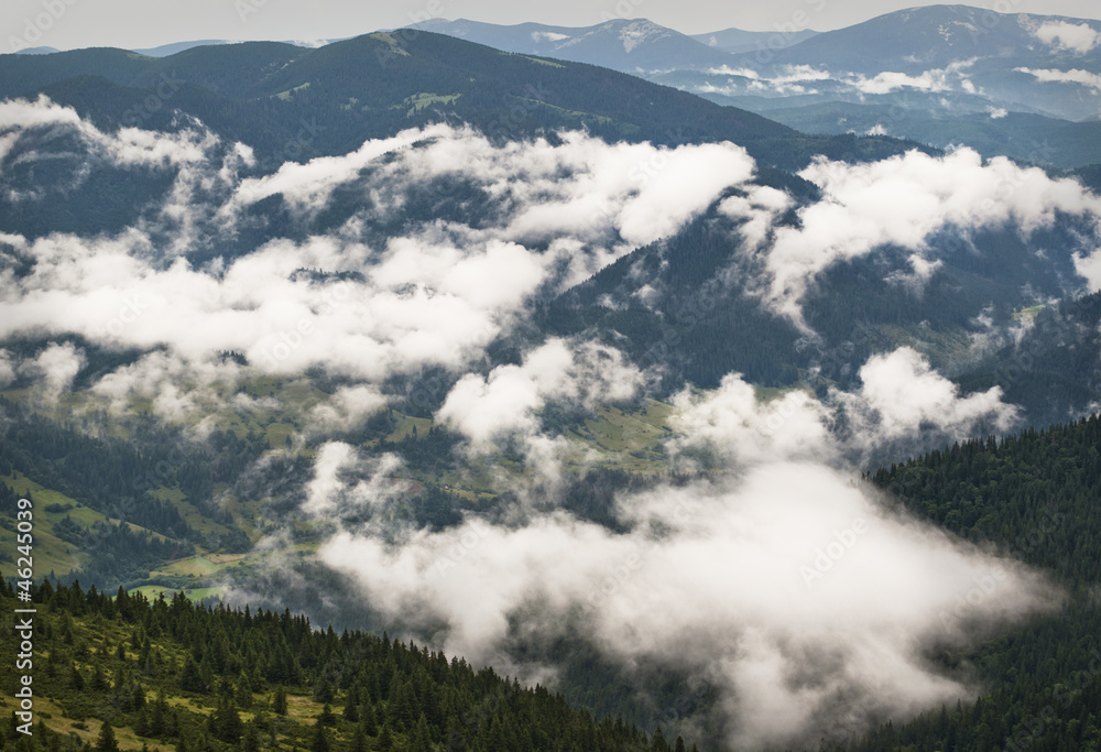 Formation of clouds in the mountains after the rain