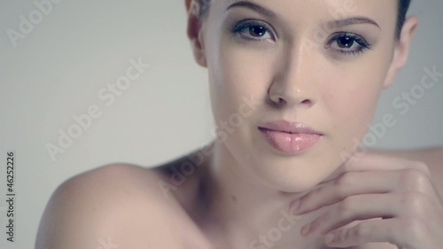 Beautiful model close up reflected in mirror