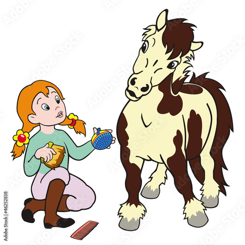 girl grooming pony