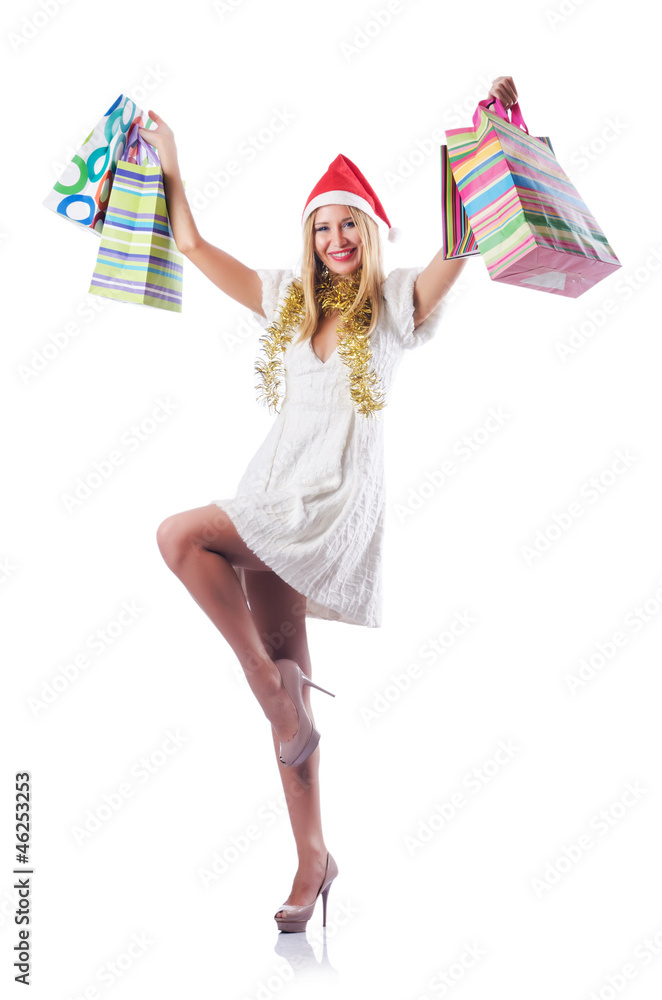 Young woman in christmas shopping concept Young woman in christmas shopping concept