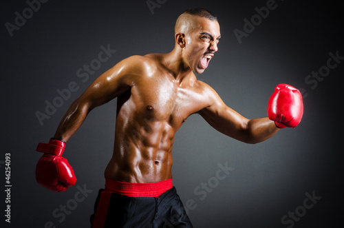 Muscular boxer in studio shooting © Elnur