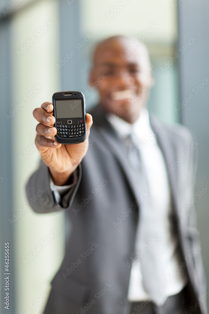 african american businessman with a smart phone african american businessman with a smart phone