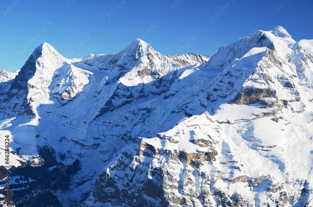 Obraz premium Eiger, Moench and Jungfrau, famous Swiss mountain peaks