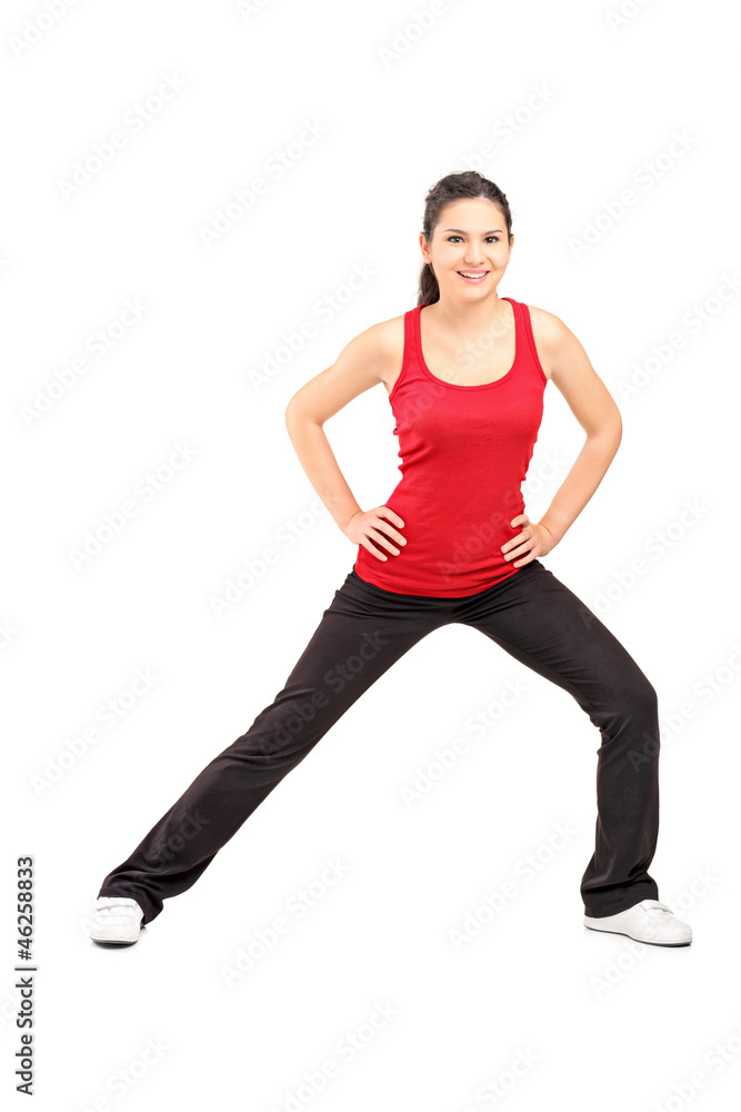 Full length portrait of a young athlete exercising Full length portrait of a young athlete exercising