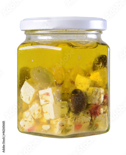 Feta cheese and olives in a jar