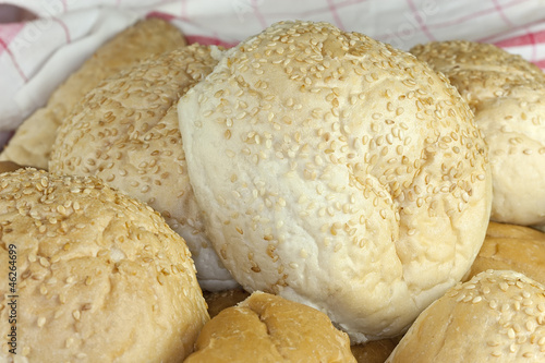 Fresh baked bread with cloth photo