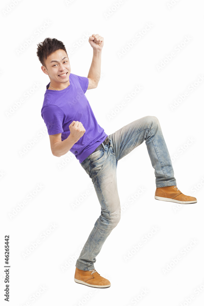 full length of happy young asian man full length of happy young asian man