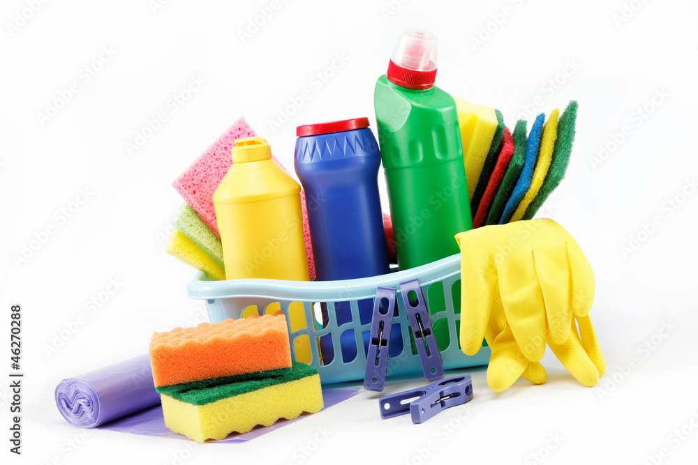 Detergent bottles, rubber gloves and cleaning sponge on a white Detergent bottles, rubber gloves and cleaning sponge on a white