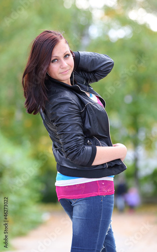 Portrait of sweet young woman enjoying at the park