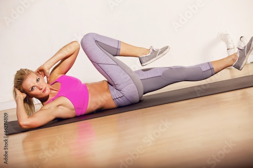 Fototapeta Naklejka Na Ścianę i Meble -  Gorgeous Woman Doing Her Workout
