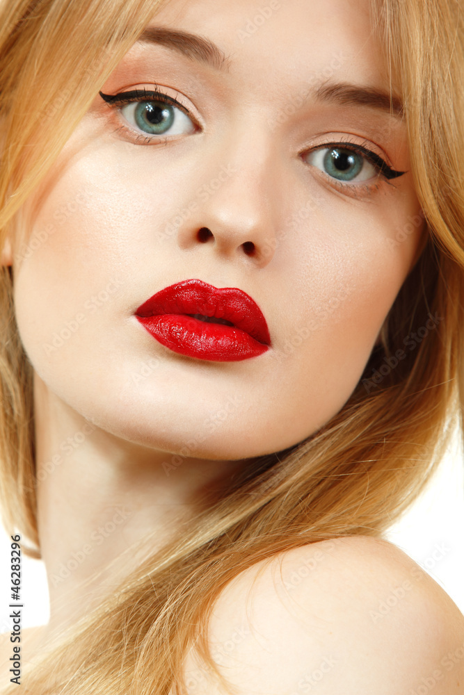 Beautiful woman face closeup with long blond hair and vivid red Beautiful woman face closeup with long blond hair and vivid red