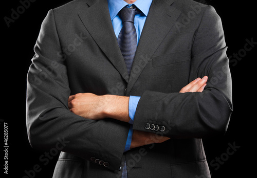 Obraz na plátně Businessman with folded arms