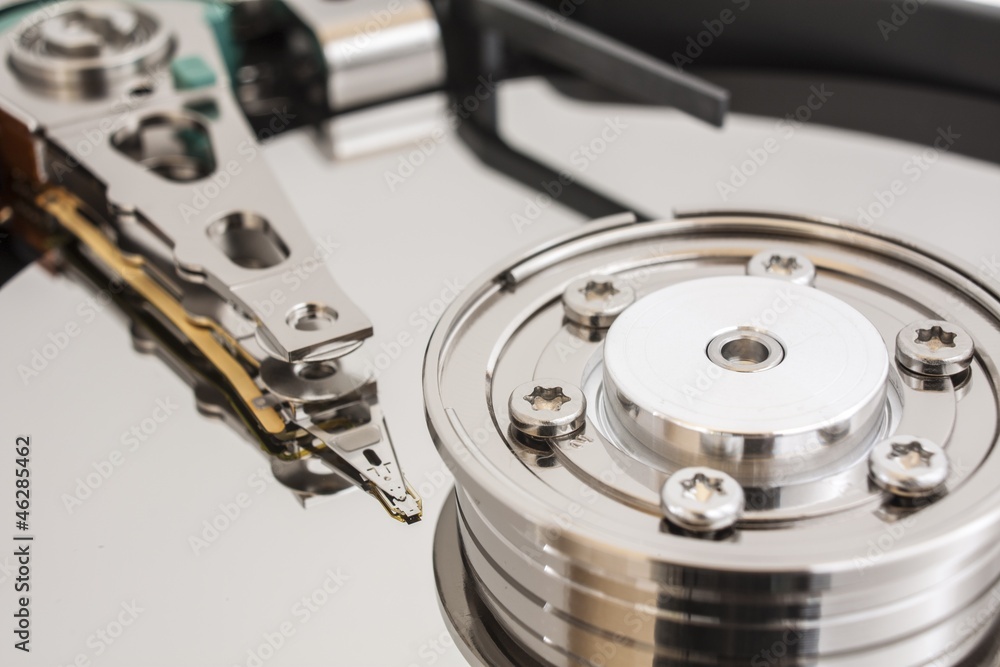 Close up of opened hard disk drive Close up of opened hard disk drive