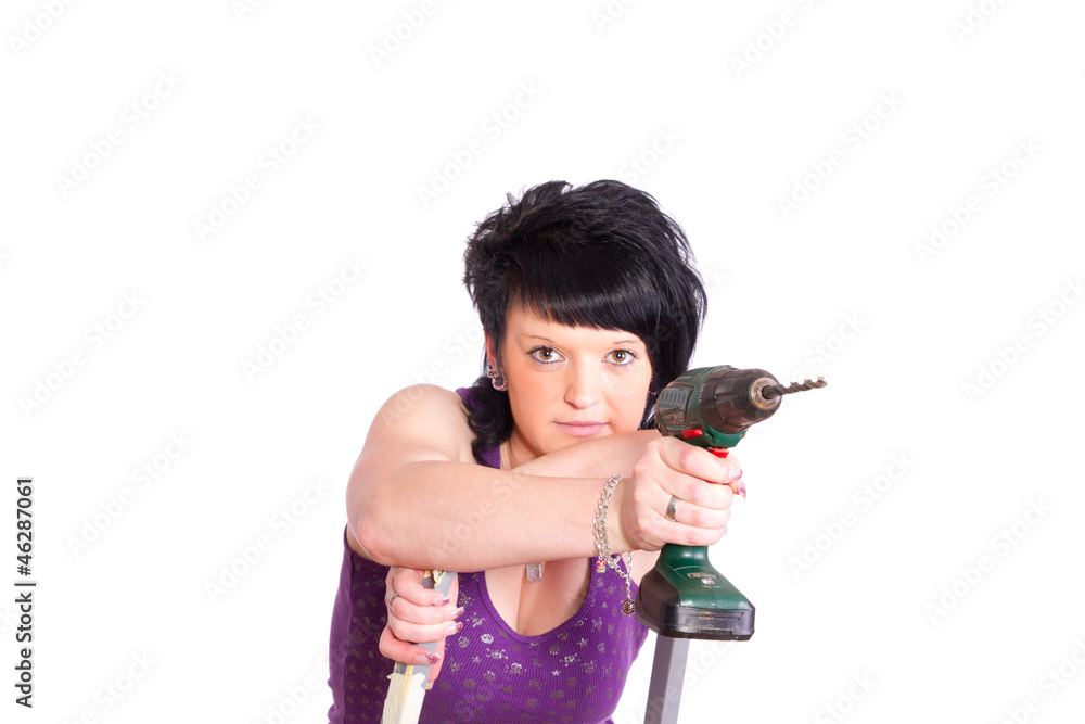 junge Handwerkerin nimmt Maß junge Handwerkerin nimmt Maß