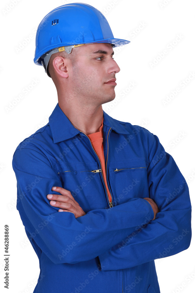 Laborer with arms crossed on white background Laborer with arms crossed on white background