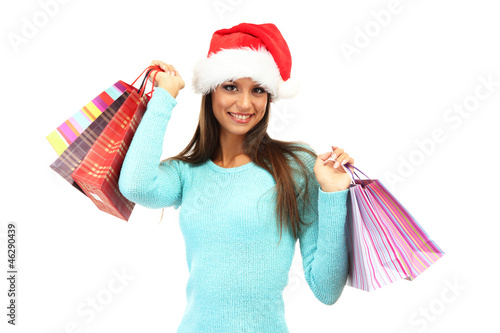 beautiful young woman with shopping bags, isolated on white