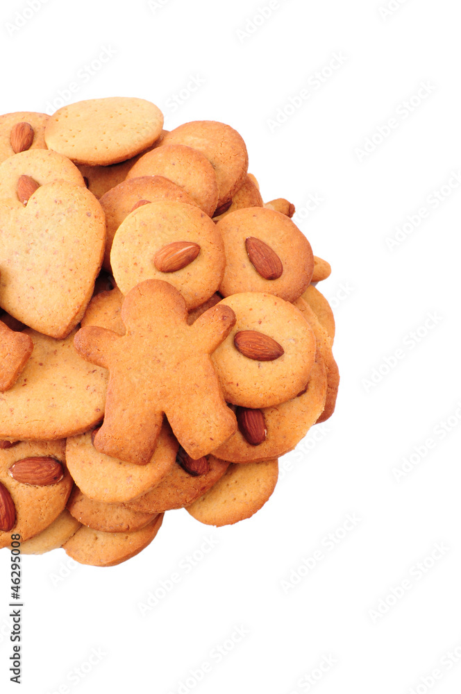 Pile of homemade almond biscuits isolated on white background Pile of homemade almond biscuits isolated on white background