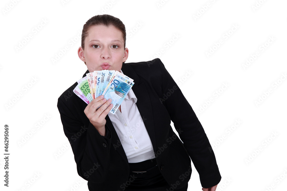 Businesswoman showing off her money Businesswoman showing off her money