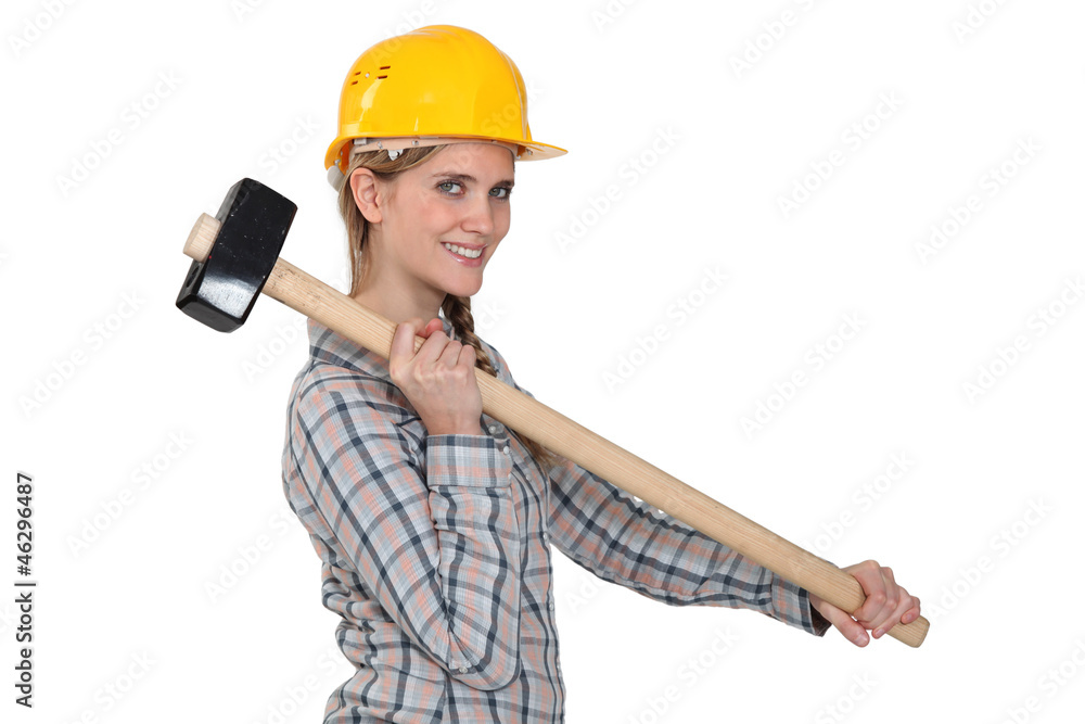 craftswoman holding a huge hammer craftswoman holding a huge hammer