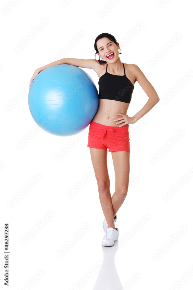 Woman with pilates exercise ball. Woman with pilates exercise ball.