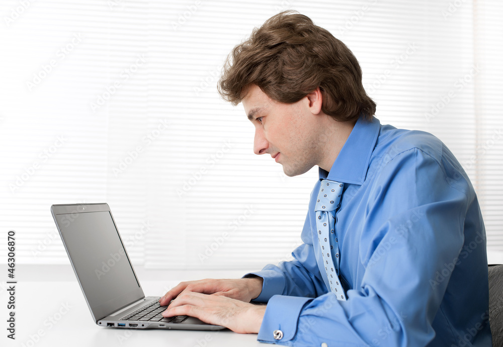 handsome business man using laptop handsome business man using laptop