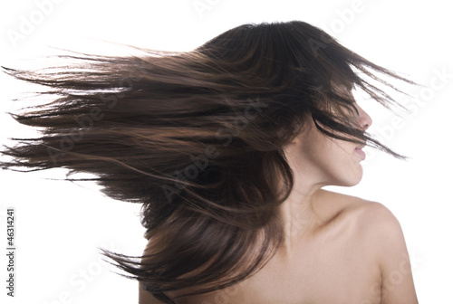 Ragazza con capelli al vento photo