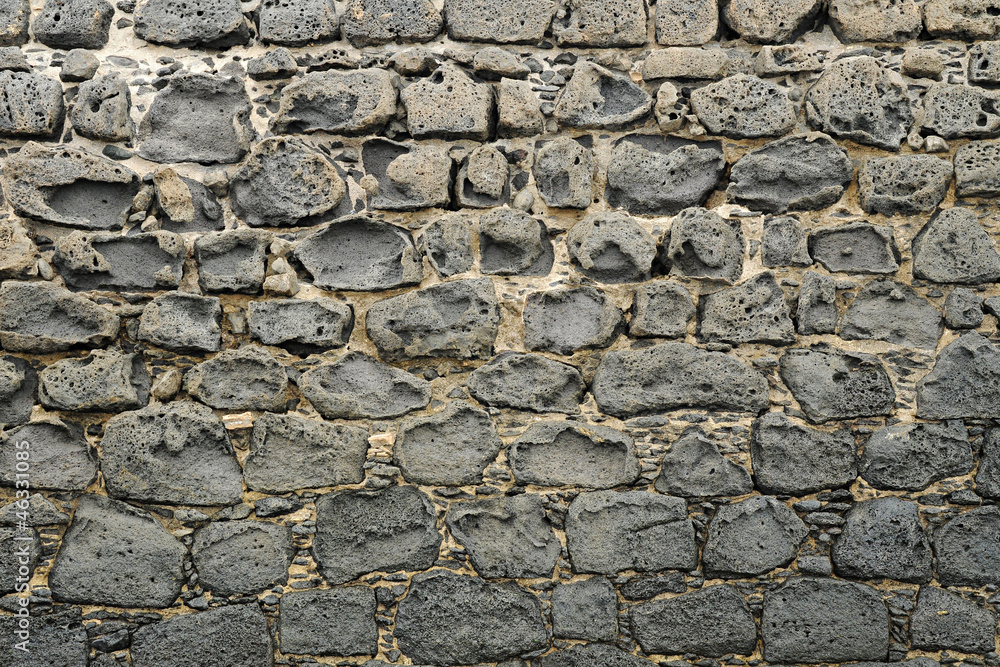 Obraz premium Rough stone wall