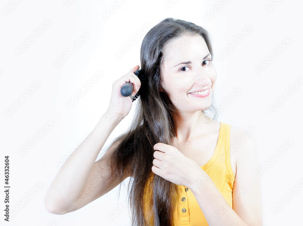 Young woman is combing Young woman is combing