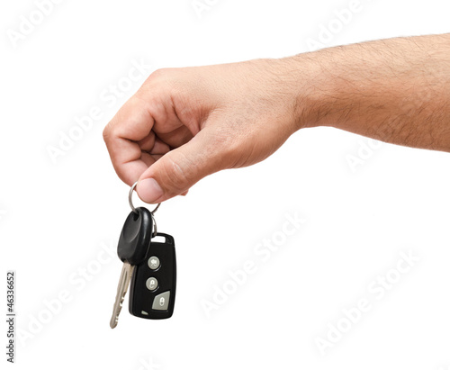 Male hand holding a car key