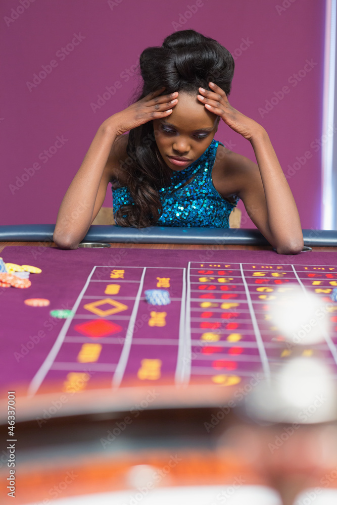 Woman losing at roulette