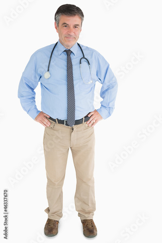 Doctor standing and smiling