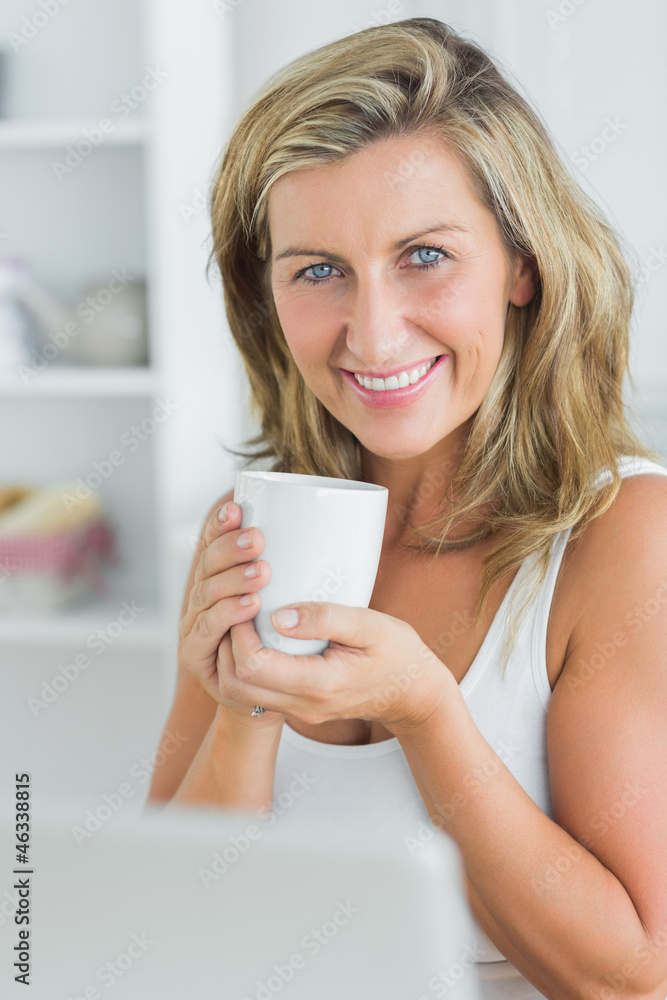 Happy woman holding mug Happy woman holding mug