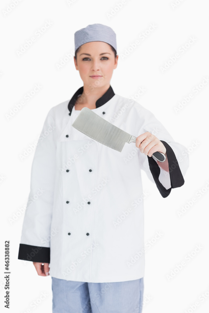 Serious cook holding a meat cleaver Serious cook holding a meat cleaver