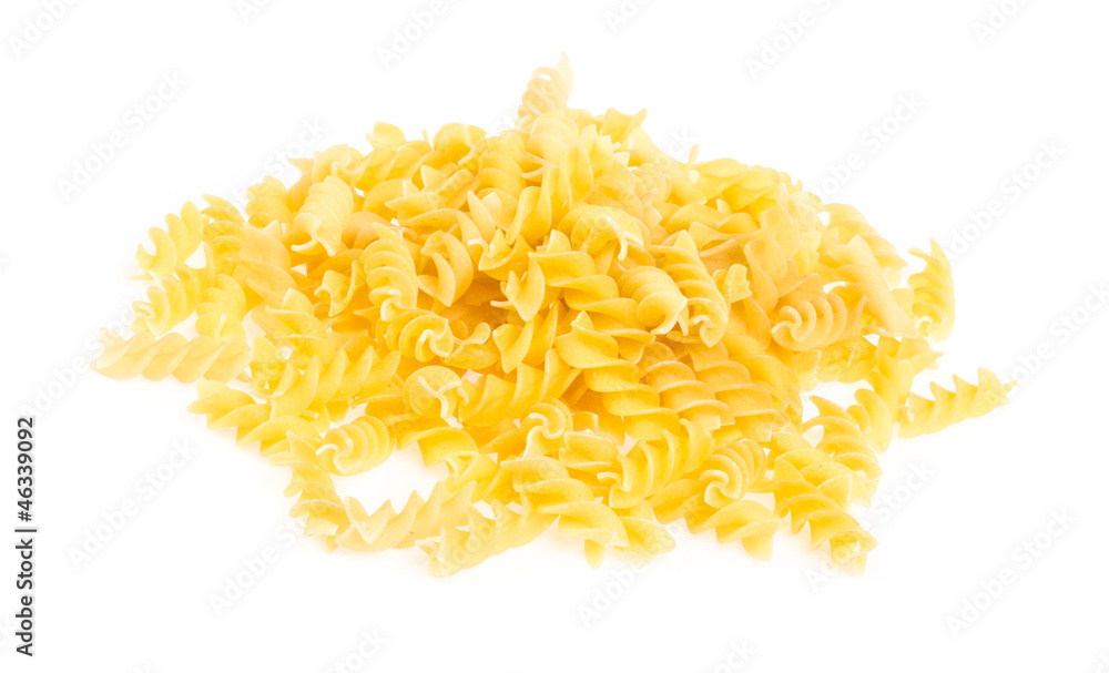 A portion of Rotini corkscrew pasta isolated on white. A portion of Rotini corkscrew pasta isolated on white.