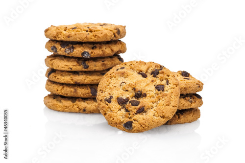 A stack of chocolate chip cookies isolated on a white background