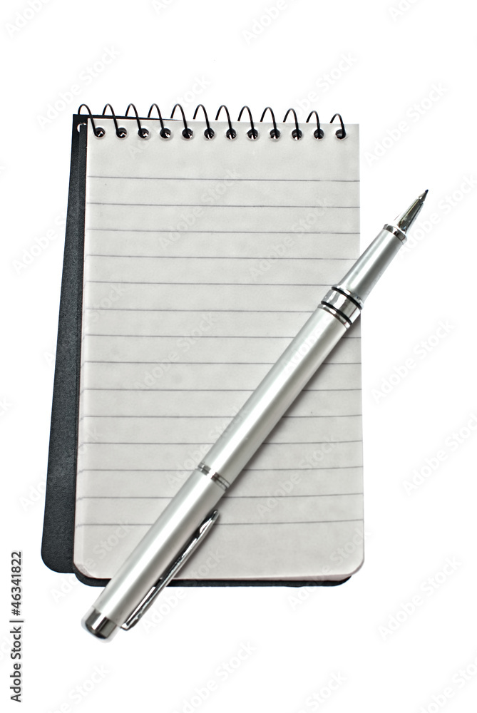 Notepad and pen. Notepad and pen.