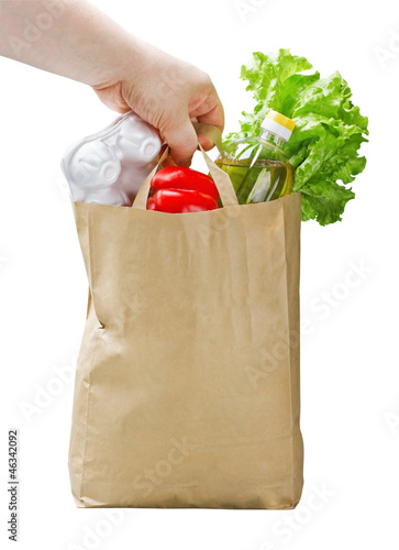 paper bag with food in hand