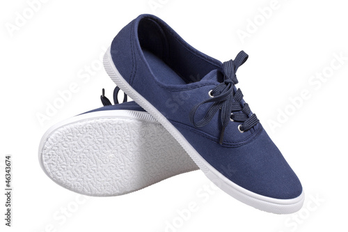 A pair of walking blue sneakers isolated with clipping path