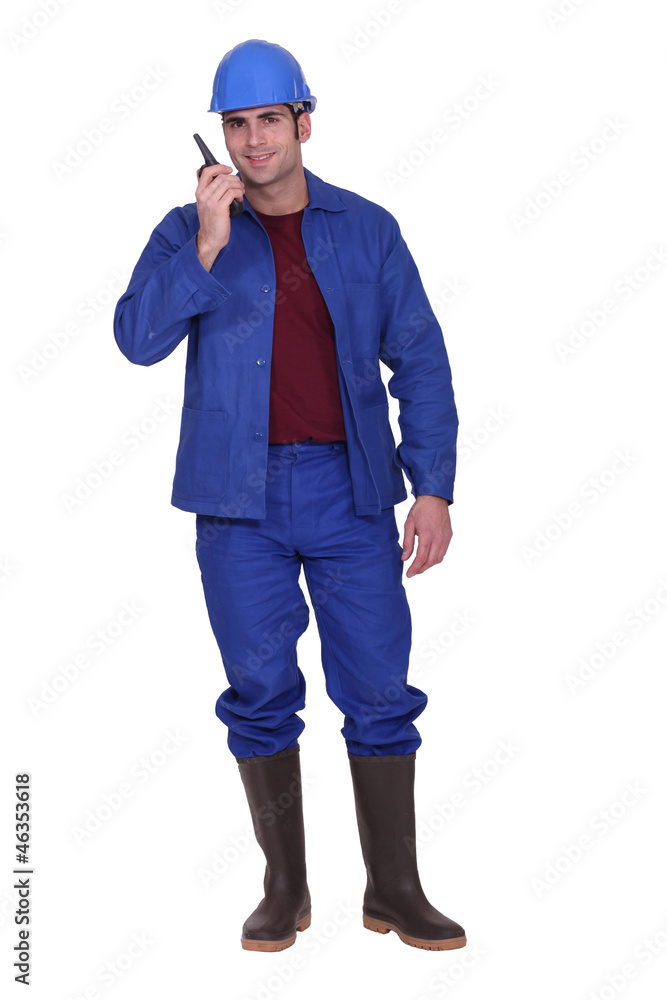 craftsman using his walkie talkie craftsman using his walkie talkie