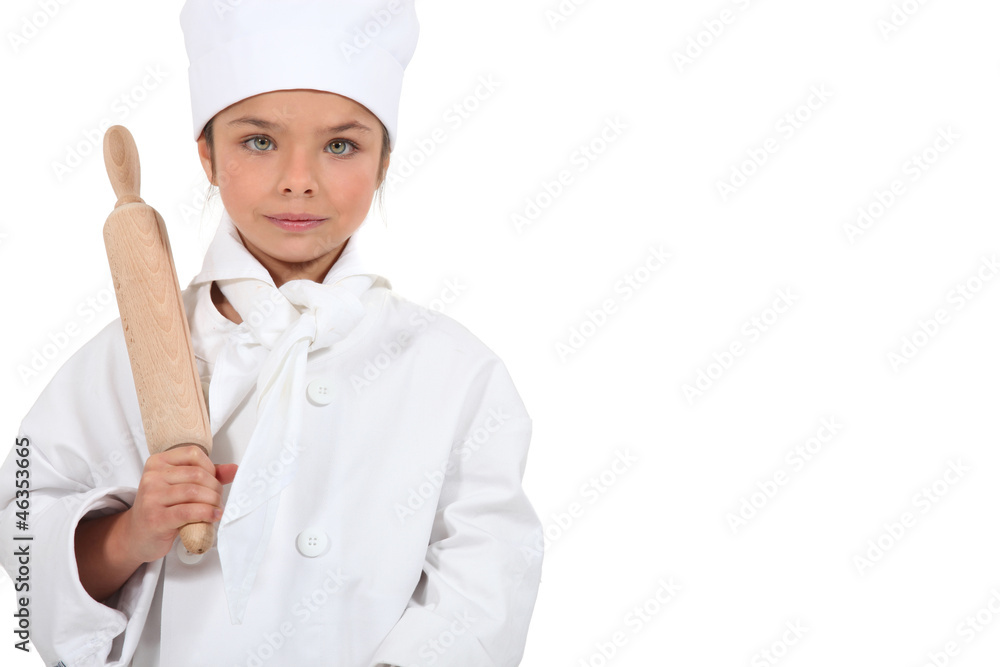 Child chef with a rolling pin Child chef with a rolling pin