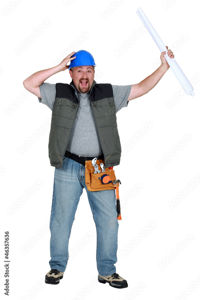 hilarious foreman standing holding blueprints hilarious foreman standing holding blueprints