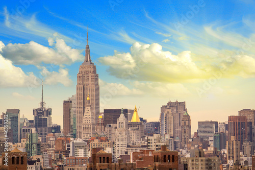 Manhattan Skyscrapers with Cloudy Sky, New York City © jovannig