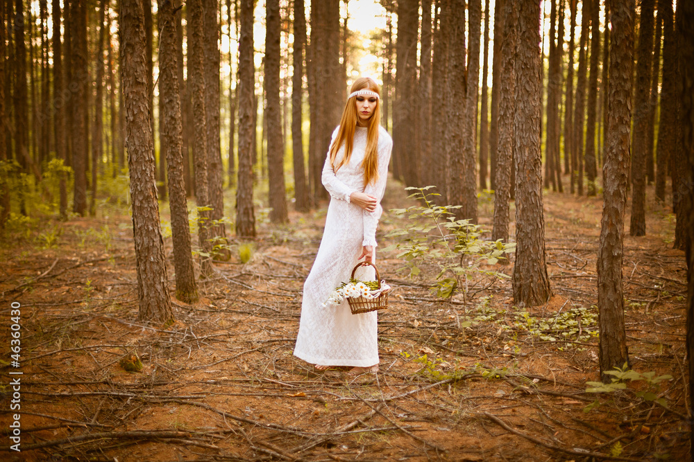 beautiful woman standing in forest beautiful woman standing in forest