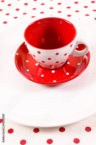 Empty red and white cup