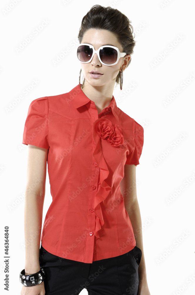 High fashion model in fashion dress wearing sunglasses High fashion model in fashion dress wearing sunglasses