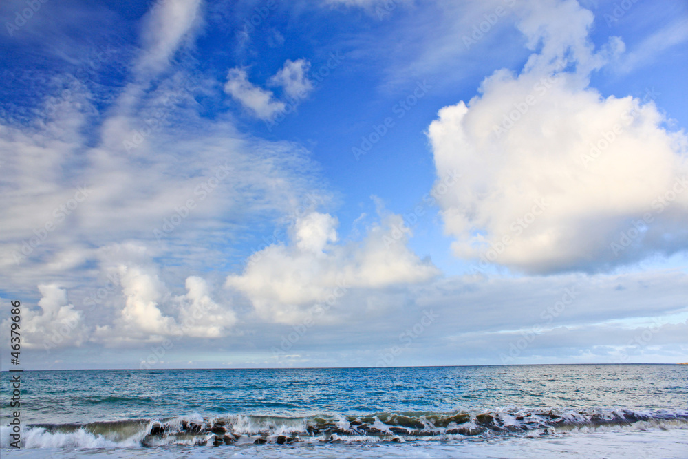Fantastic  clouds contrast on tropical caribean beach. Cuba