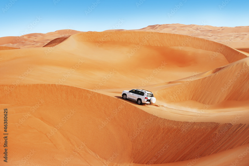 4 by 4 dune bashing is a popular sport of the Arabian desert - obrazy, fototapety, plakaty 