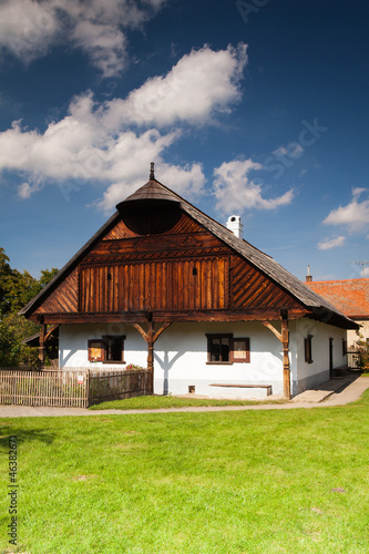 Historic rural wooden house in an open-air museum photo