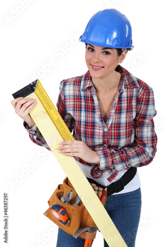 Woman using a right angle ruler