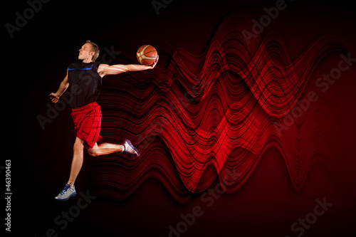 Basketball player with a ball © Sergey Nivens